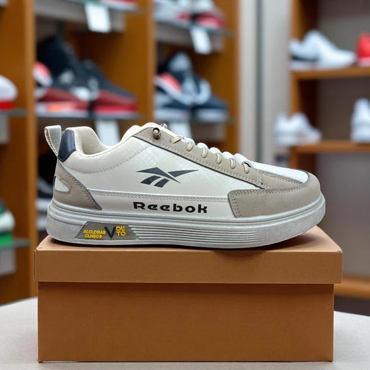 307 - Brown Reebok Sneakers with Accent and Sporty Design