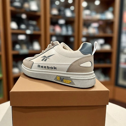 307 - Brown Reebok Sneakers with Accent and Sporty Design