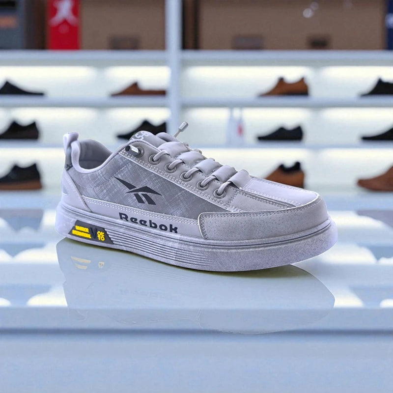 307 - Gray Reebok Sneakers with Accent and Sporty Design